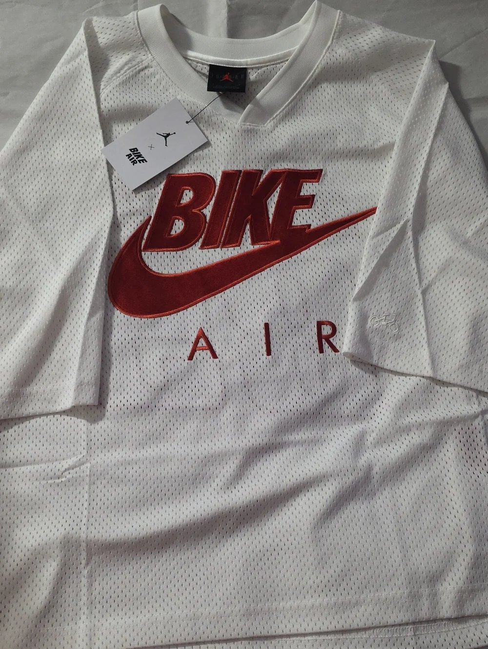 Brand New with Tags Nigel Sylvester Nike Bike Air Jersey in White Size Large.